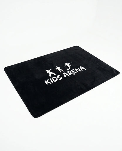 Kids Arena antislip speelmat in zwart met wit logo, van bovenaf